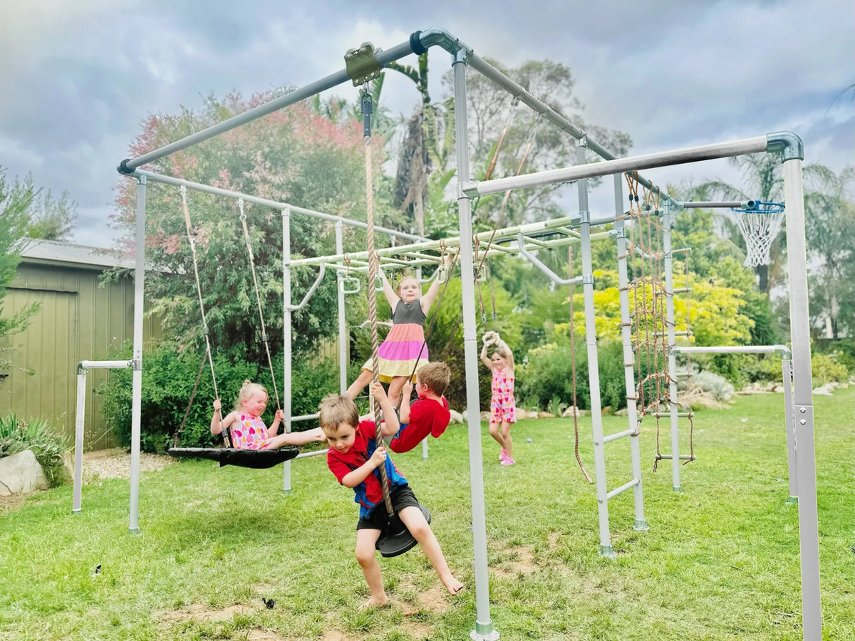 Flying Fox (Zip Line) in use on a Growplay frame in a family garden