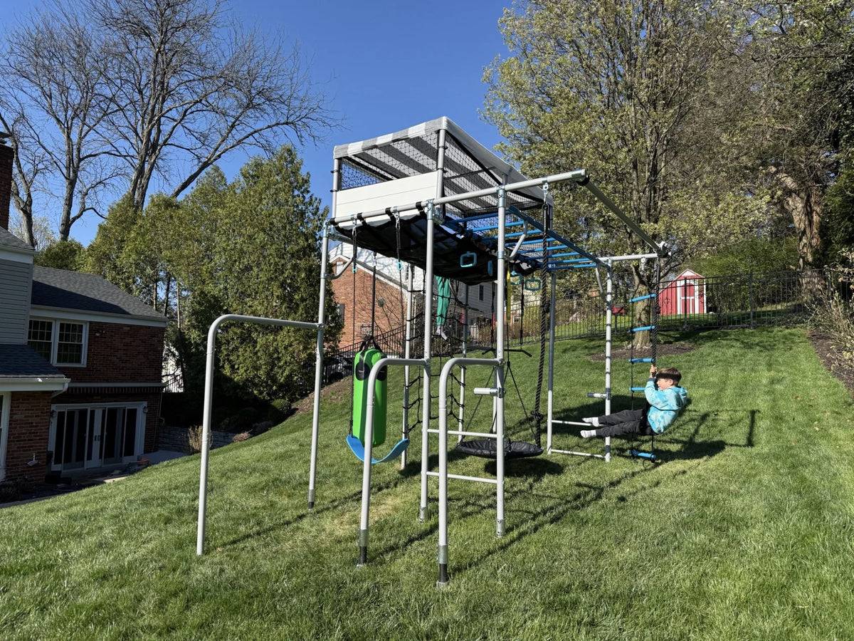 Levelling Kit (Sloped Gardens) in use on a Growplay frame in a family garden