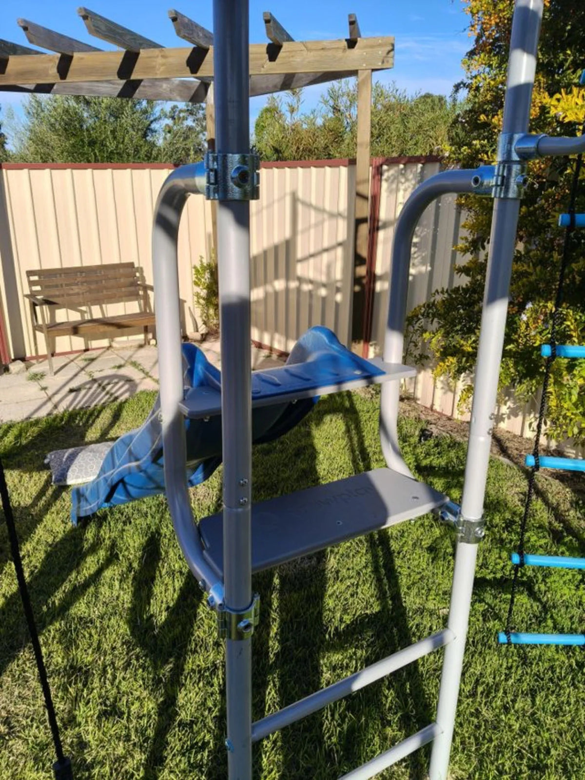 Close-up of the Growplay Slide Mount platforms, handrails and frame clamps — slide sold separately