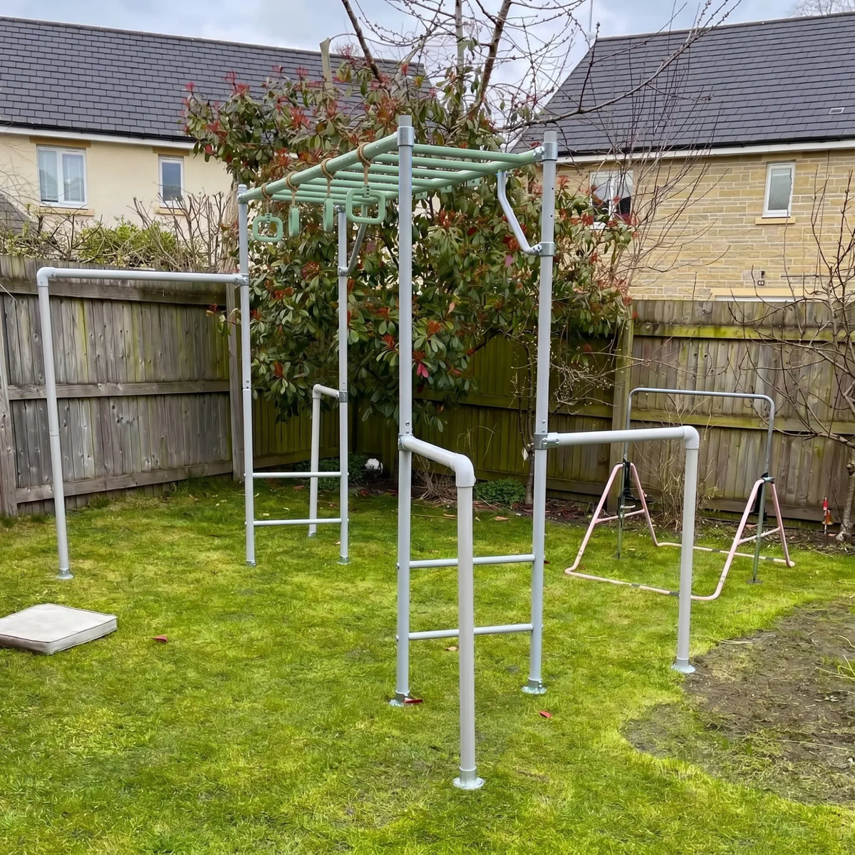 THE MEDIUM in green in a family garden